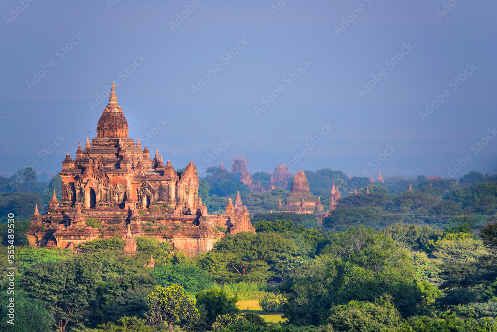 Bagan, Myanmar Temples in the Archaeological Park, Burma. Sunrise. Fog in the Sky