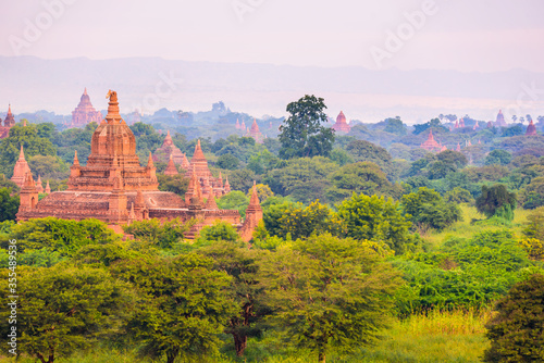 View of a Majestic Ancient Pagoda inside a Forest in Bagan  Myanmar. Beautiful Morning Time  Copy Space 