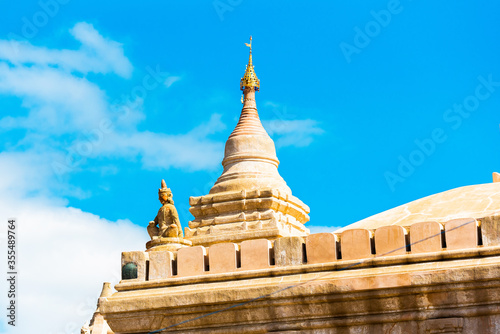 View of the Top with a Golden Dom and a Statue of the Ananda Temple