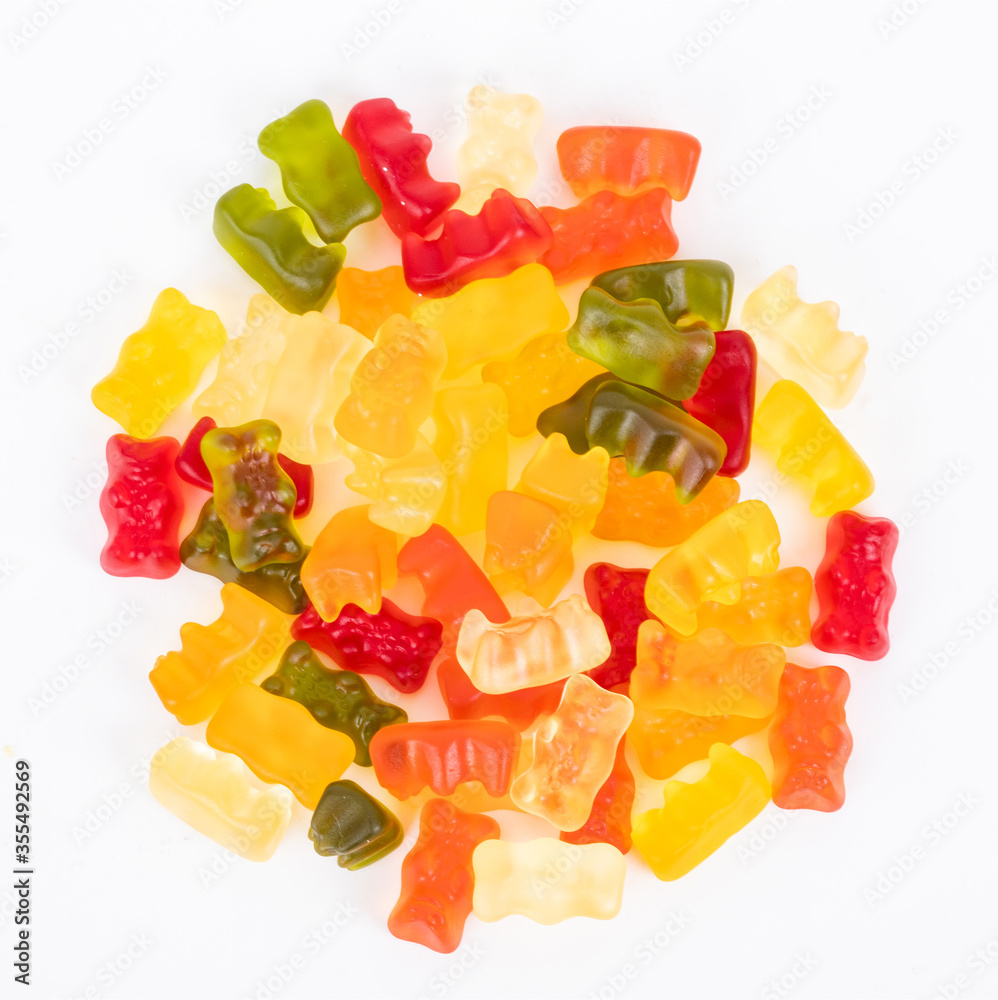 A bunch of colorful jelly candies in the form of bears. Colourful candy background A bunch of colorful jelly candies in the form of bears. Colourful candy background