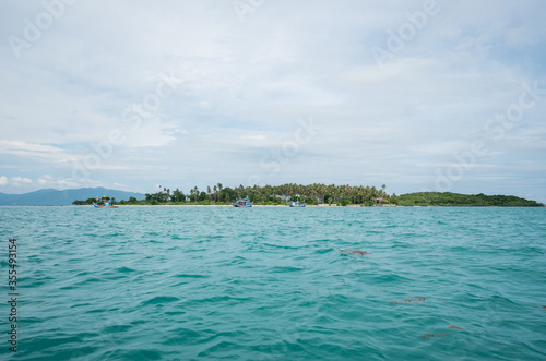 Wallpaper Mural Clear blue sea water with islands, sky and cloud on a horizon. Vacation background in summer in tropical countries. Torontodigital.ca
