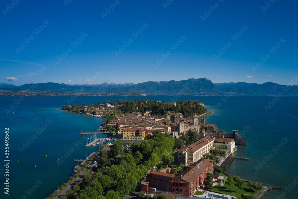 Rocca Scaligera Castle in Sirmione. Garda Lake, Italy Aerial view.  Famous for thermal waters
