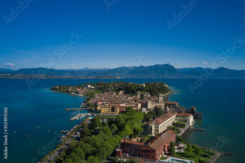 Rocca Scaligera Castle in Sirmione. Garda Lake, Italy Aerial view. Famous for thermal waters