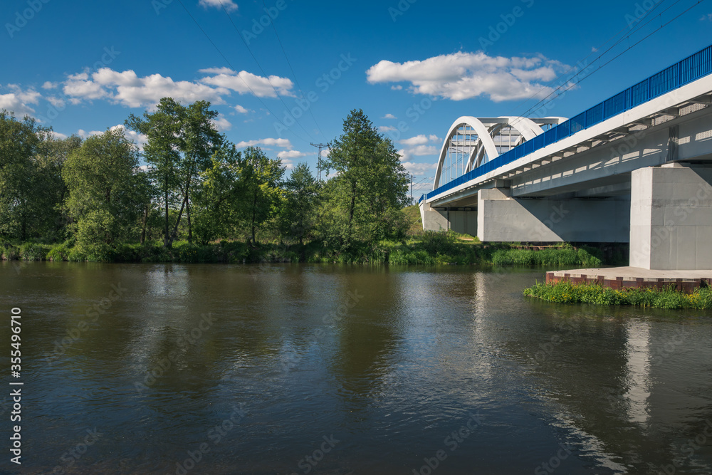 Bridge over the Pilica river at beautiful sunny day near Gapinin, Lodzkie, Poland