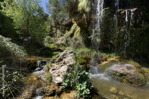 Waterfall in Bogarra province of Albacete Spain. Horizontal shot with natural light. photo