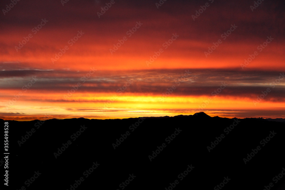 Beautiful sunset with silhouette of mountains