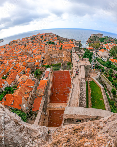 A view of a Dubrovnik Old Town from the city walls, with basketball course photo