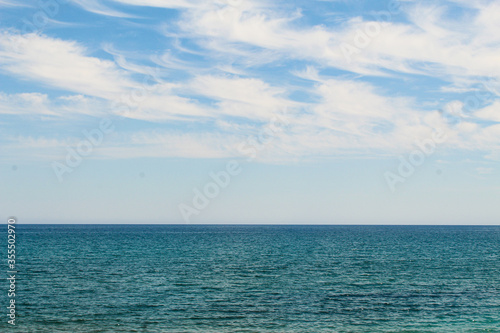 The universal concept of summer: blue sky and the peaceful sea