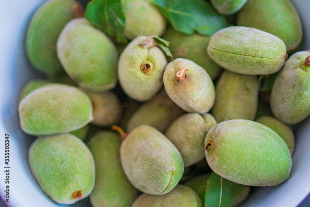 Nuts of green almonds in a skarlup Nuts of green almonds in a skarlup
