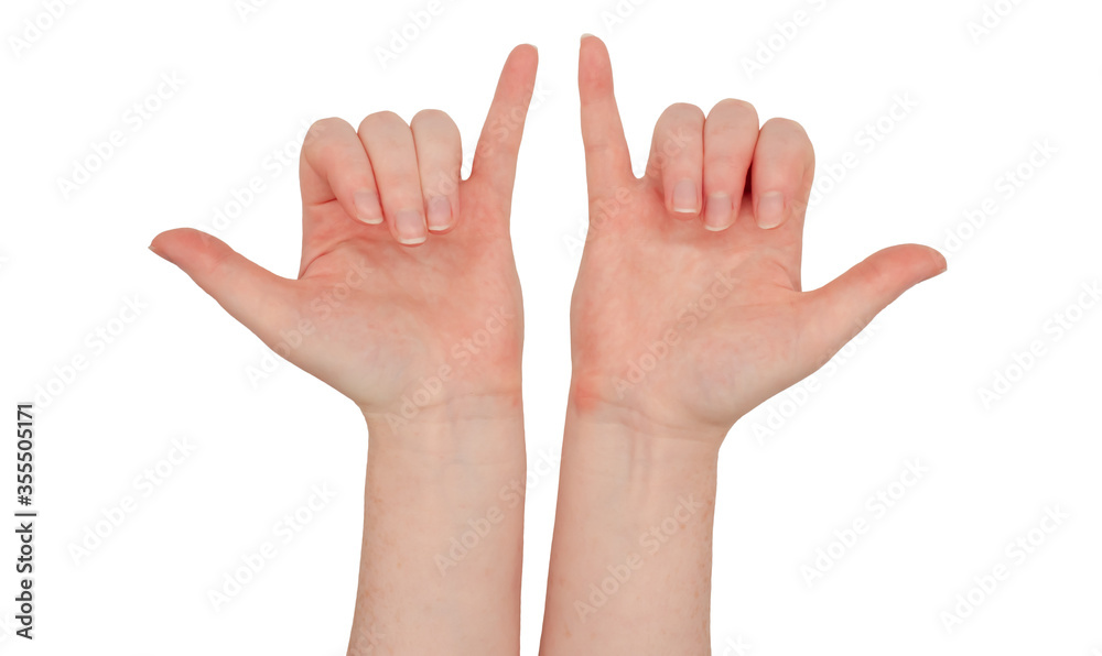Freckled white hands. Hands make the shaka, dude, or surfer gesture, palms up. Female hand isolated Freckled white hands. Hands make the shaka, dude, or surfer gesture, palms up. Female hand isolated