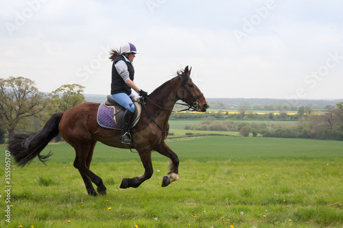 Rider and horse enjoying the togetherness of moving at speed through the Shropshire countryside.
