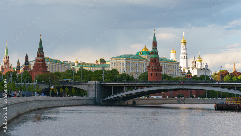 Moscow cityscape in spring. Kremlin wall, Towers, Residence of President of the Russian Federation, Ivan the Great Bell Tower, Dormition Cathedral, Bolshoy Kamenny Bridge