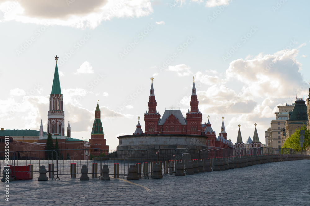 Photography of the State Historical Museum at the Red Square in Moscow. Bright blue spring sky over the city. Back lit photography. Photography of the State Historical Museum at the Red Square in Moscow. Bright blue spring sky over the city. Back lit photography.