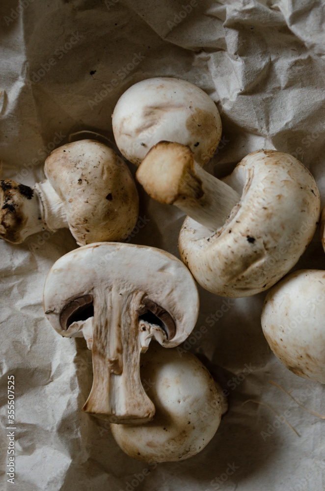 fresh champignon mushrooms on a clay plate fresh champignon mushrooms on a clay plate