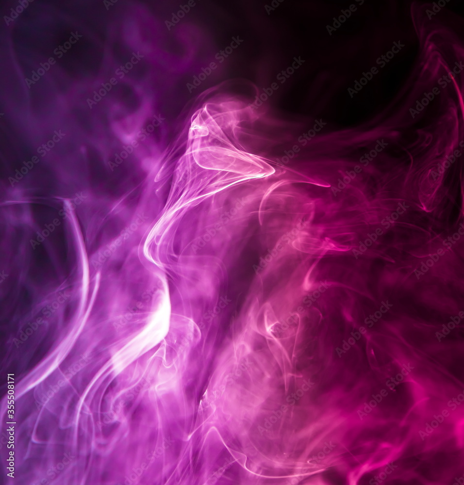 Colored smoke on black background