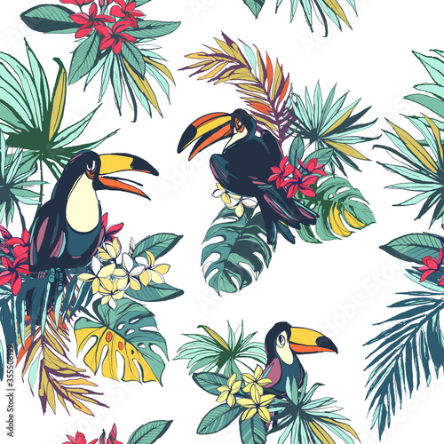 Tropical floral summer seamless pattern with palm beach leaves, tropical flowers and toucan birds.