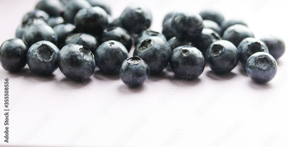 ripe blueberries on a white background close up ripe blueberries on a white background close up