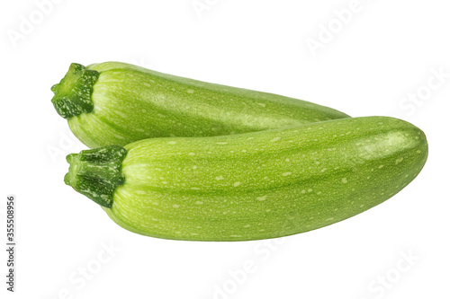 Fresh courgettes zucchini isolated on white background