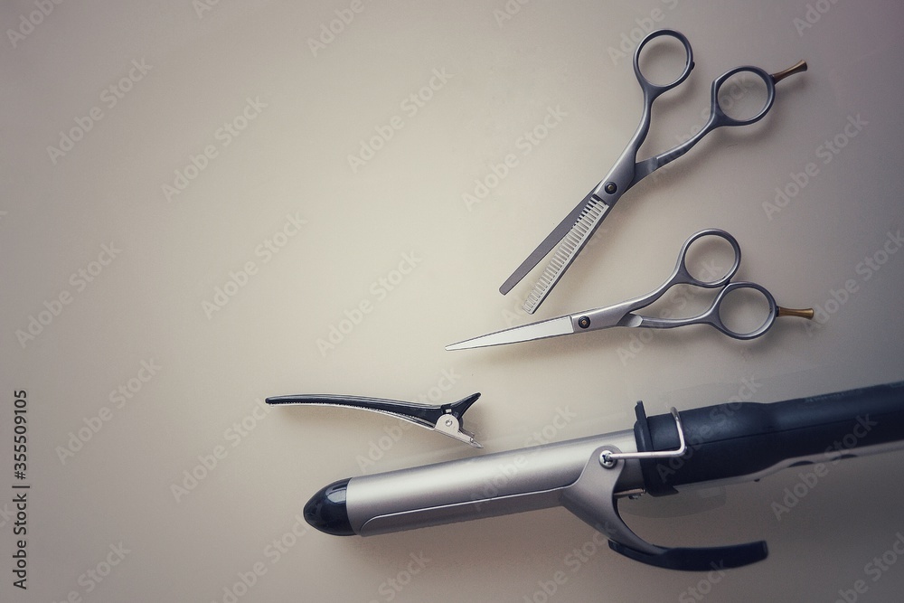 Obraz premium Tools for the work of a hairdresser and stylist in a beauty salon. High quality photo for banner design, website.