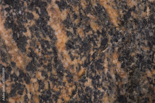 The texture of a granite stone, close-up. Background.