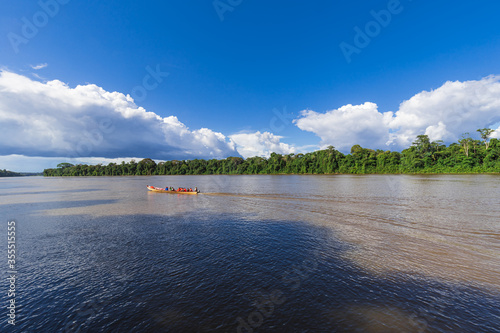 Paramaribo, Suriname - August 2019: Traditional Boat With Passengers Sailing Along The Suriname River.