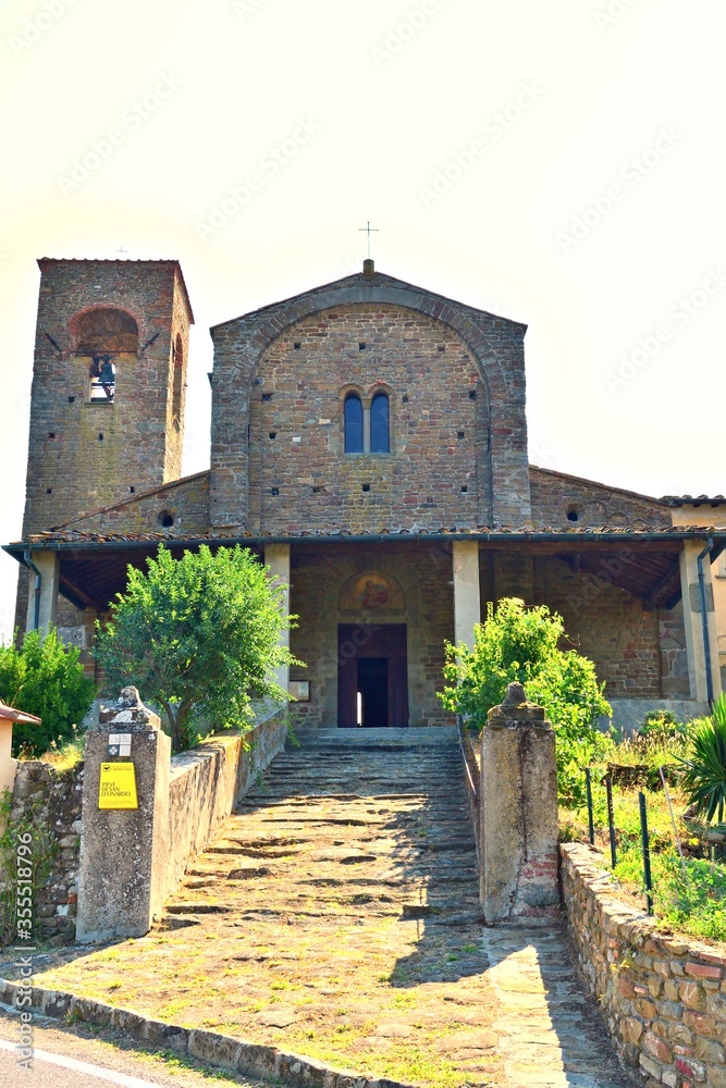 external facade of the parish church of Santa Maria and San Leonardo in the 11th century Romanesque style located in Artimino in the municipality of Carmignano in the city of Prato in Tuscany, Italy

