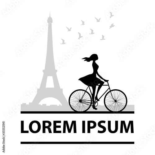 young woman riding bike with Eiffel tower in behind