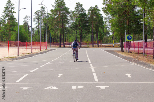 cyclist on the sports ground, end of quarantine, summer sport, active lifestyle