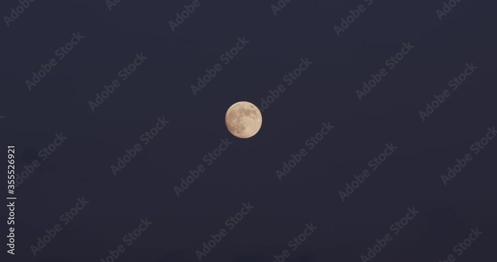 Moon in the sky You can see birds flying Moon in the sky You can see birds flying