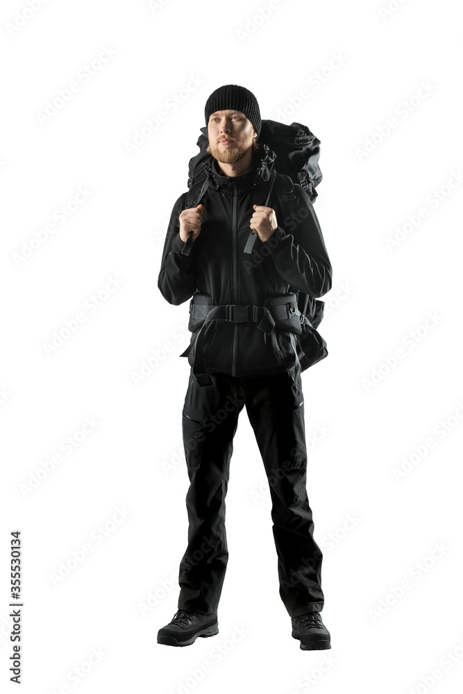 tourist - backpacker in black touristic clothes