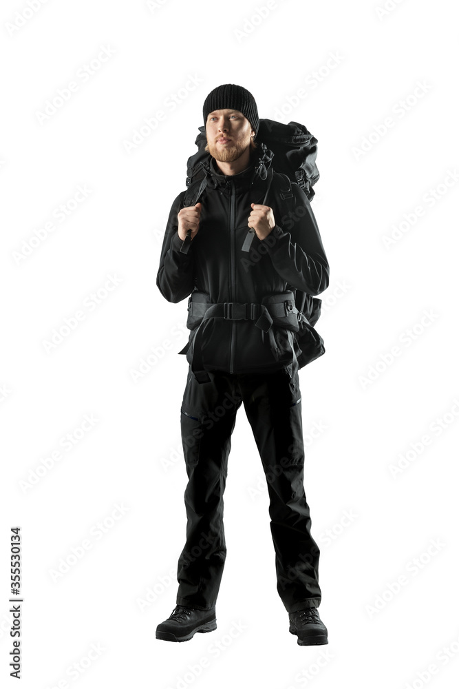 tourist - backpacker in black touristic clothes tourist - backpacker in black touristic clothes