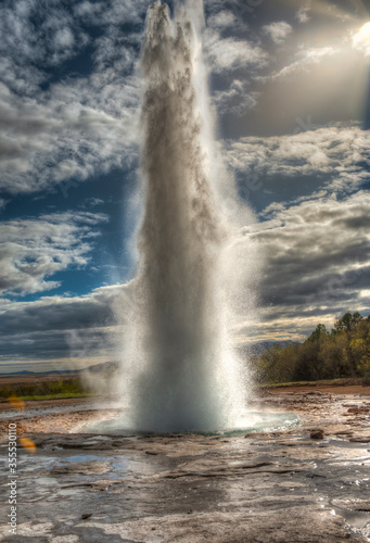 Strokkur is a geyser in the geothermal region near the Hvit   River and Reykjavik city  considered one of the most famous geysers in Iceland  The geyser erupts on average every 4 to 8 minutes.
