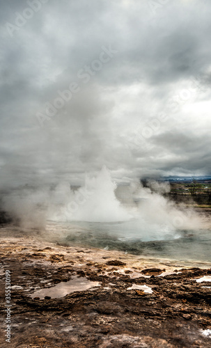 Strokkur is a geyser in the geothermal region near the Hvit   River and Reykjavik city  considered one of the most famous geysers in Iceland. Panoramic