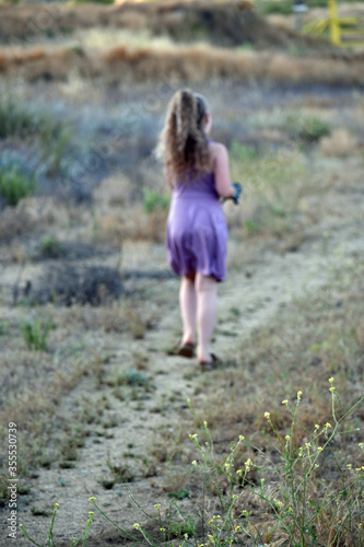 Girl Walking  in the Country © LaDonna