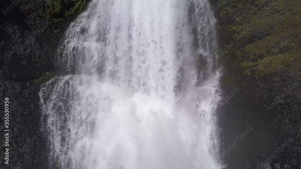 Haifoss waterfall in the highlands of Iceland, Aerial view. Dramatic landscape of Waterfall in Landmannalaugar canyon. (not graded DJI D-cinelike footage). Haifoss waterfall in the highlands of Iceland, Aerial view. Dramatic landscape of Waterfall in Landmannalaugar canyon. (not graded DJI D-cinelike footage).