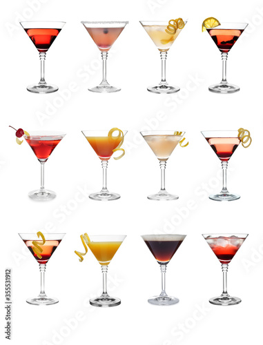 Set with different martini cocktails on white background