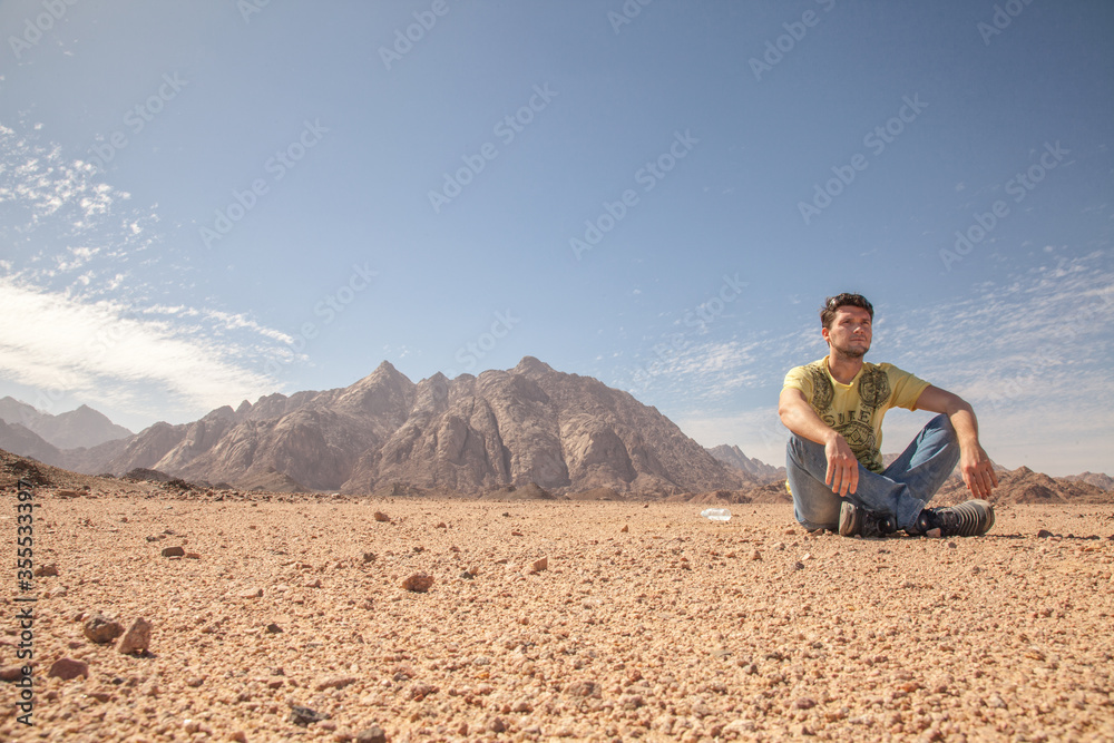 man in the desert alone 