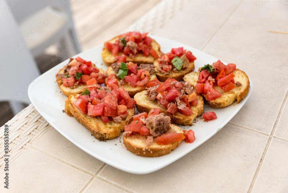 Appetizer of bruschetta with tuna Appetizer of bruschetta with tuna