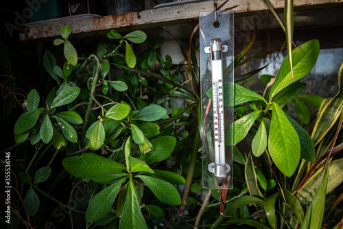 Homemade garden thermometer temperature measurement close up