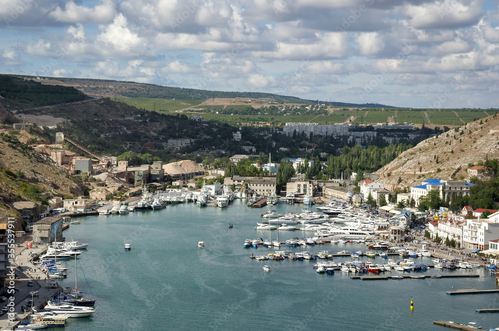 View of a quiet bay with yachts and boats