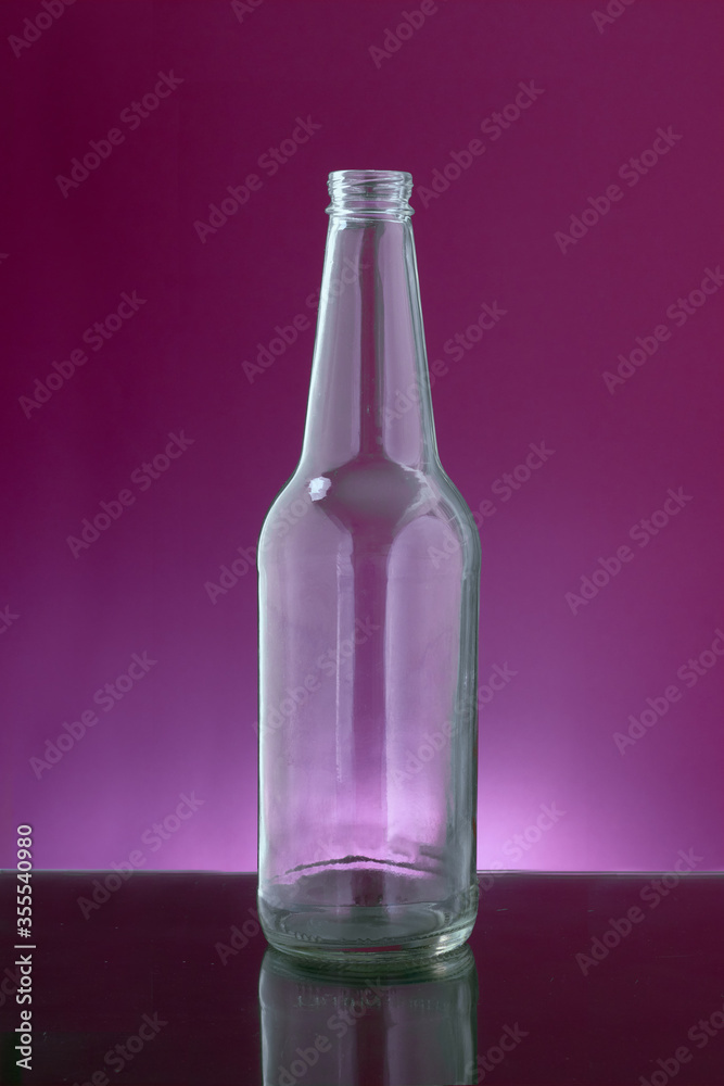 transparent beer bottle in purple background transparent beer bottle in purple background