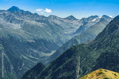 Picturesque mountain scenery with cumulus clouds. Wildlife. Hiking. Daytime. the ends of the earth