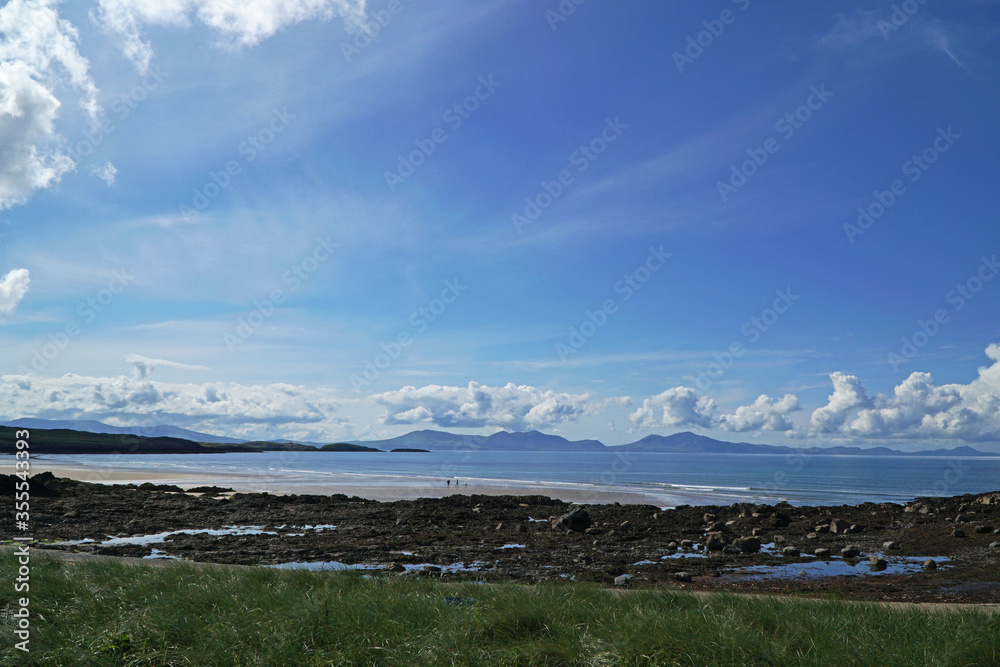 The beach at Abeffraw, Anglesey, Wales, with the mountains of Snowdonia in the distance The beach at Abeffraw, Anglesey, Wales, with the mountains of Snowdonia in the distance