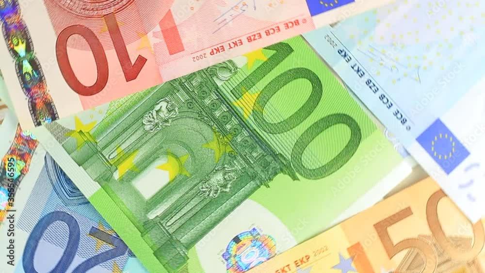 Close up of Euro Banknotes spinning clockwise. Money Perfect for any financial, commerce, treasury or banking video needs. Looping HD Video.
Close up of Euro Banknotes spinning clockwise. Money Perfect for any financial, commerce, treasury or banking video needs. Looping HD Video.