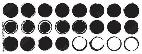 Set of black grunge circles shapes on a white background. Paint brush stamp collection