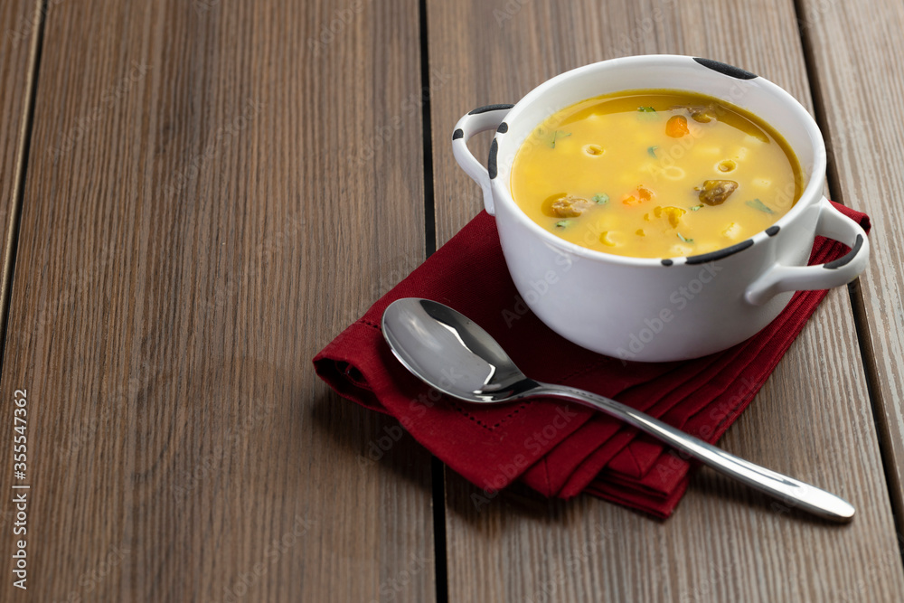 A bowl of delicious brazilian soup with beef, vegetables and noodles A bowl of delicious brazilian soup with beef, vegetables and noodles