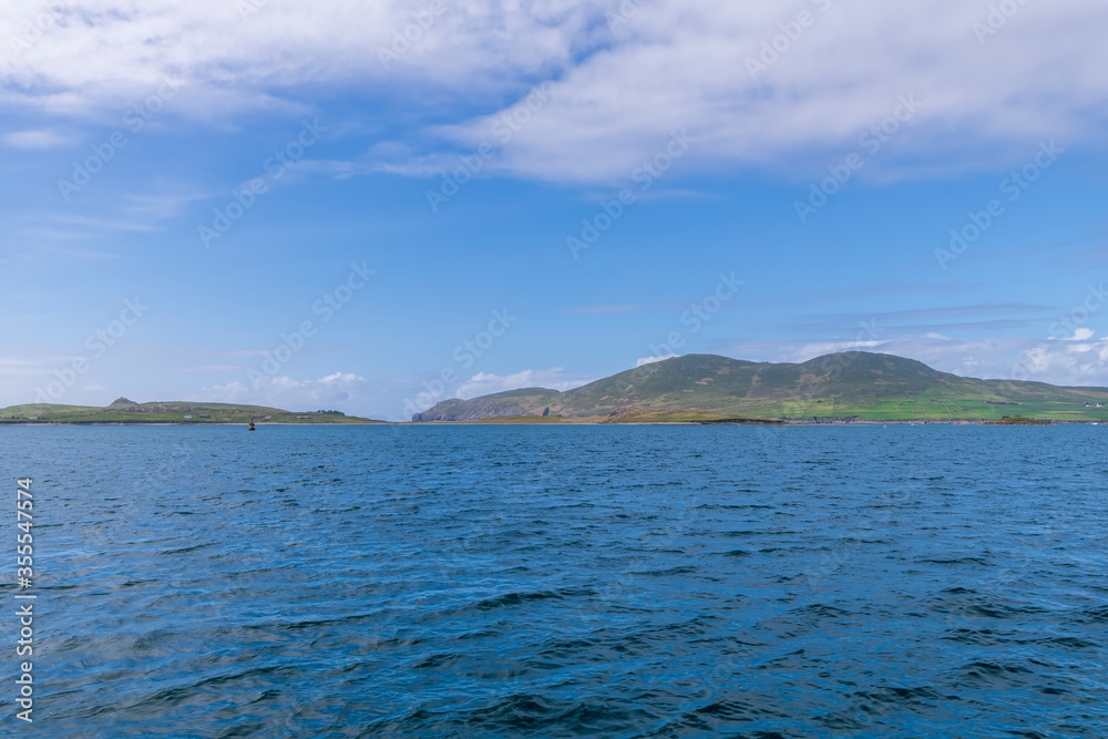 Beautiful aerial view of Beginish Island. Locations worth visiting on the Wild Atlantic Way. Scenic Irish countyside on sunny summer day, County Kerry, Ireland.