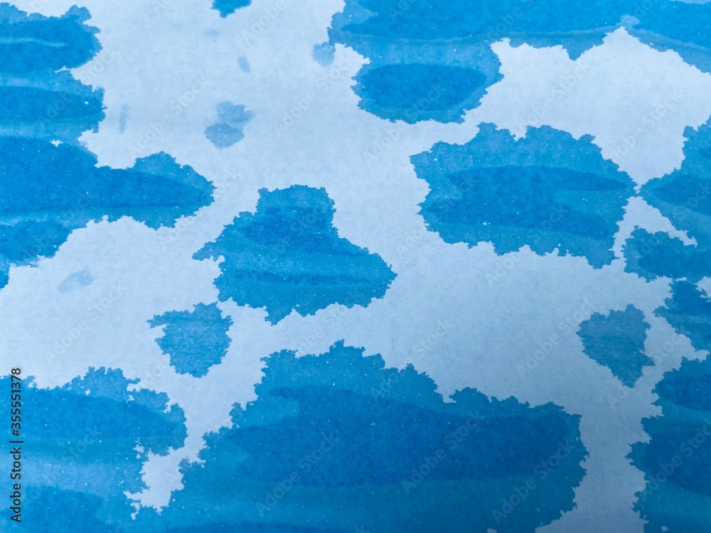 Wet on white paper with blue color texture background Wet on white paper with blue color texture background