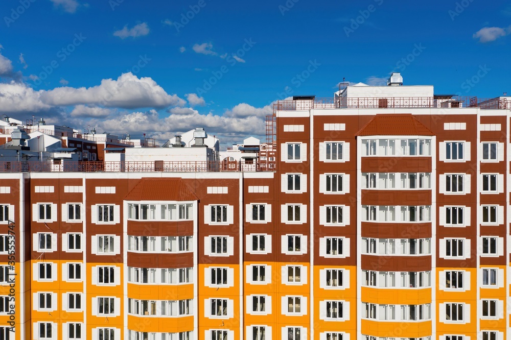 The sleeping area in the modern city. The new apartment house. Aerial view. The sleeping area in the modern city. The new apartment house. Aerial view.