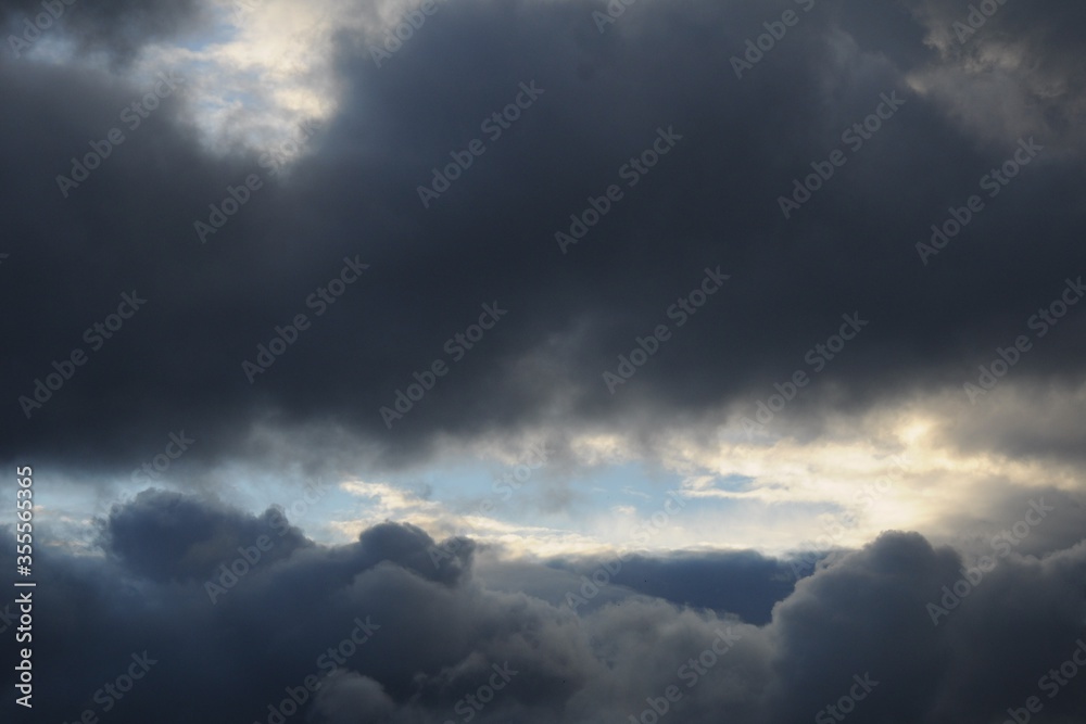 Gleam of the blue sky in thunderclouds Gleam of the blue sky in thunderclouds